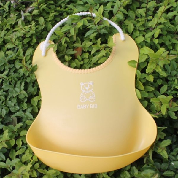 Слюнявчик с карманом Baby Bib жёлтый